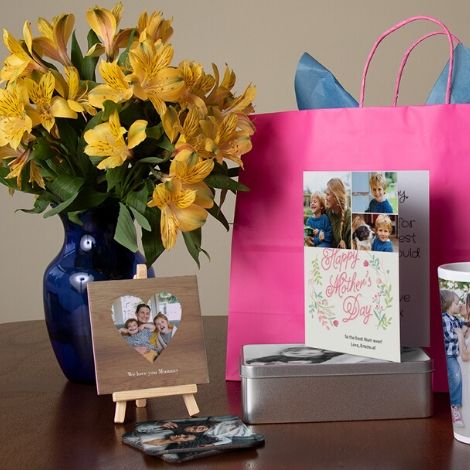 tables with gifts, gift bag and vase with flowers